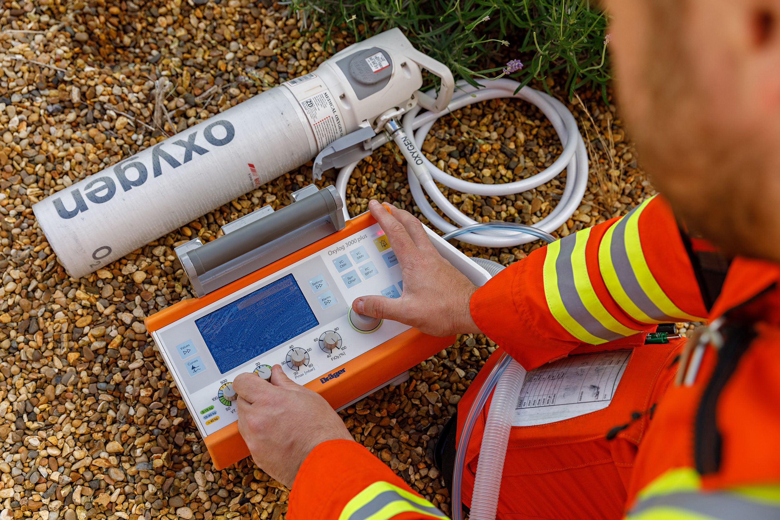 paramedic using oxylog ventilator